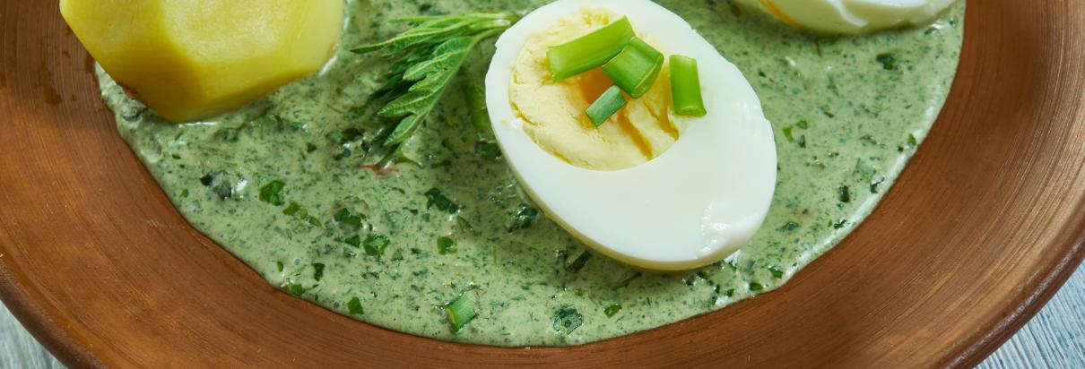 Potatoes with green sauce and chopped eggs